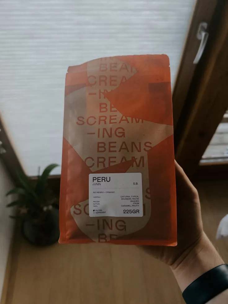 Close-up of a roast date stamped on a coffee bean bag